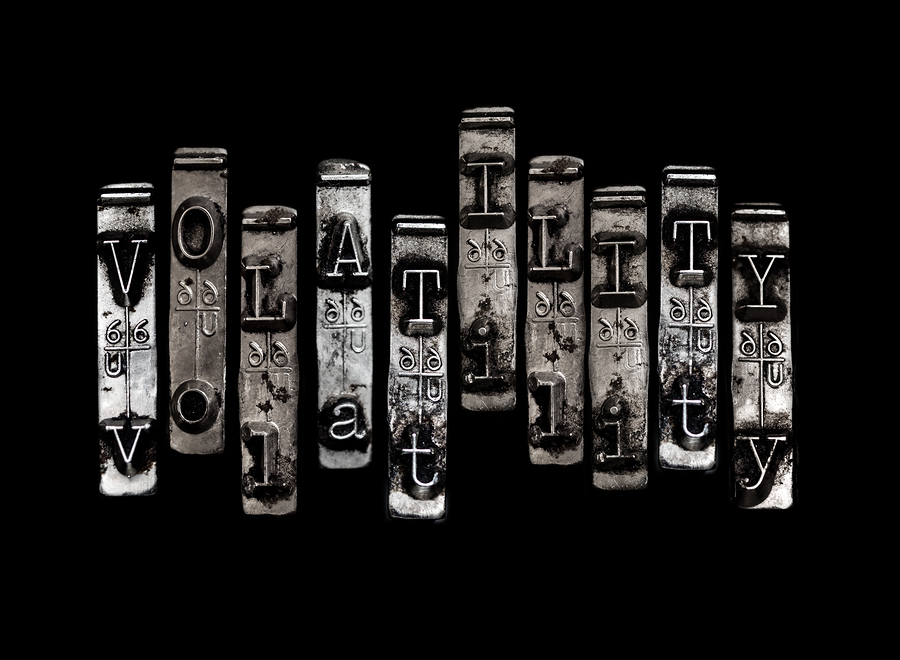 Volatility concept with bumpy letter pattern on black